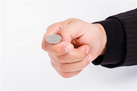 Researchers flip coins 350,000 times to find out if odds truly are .